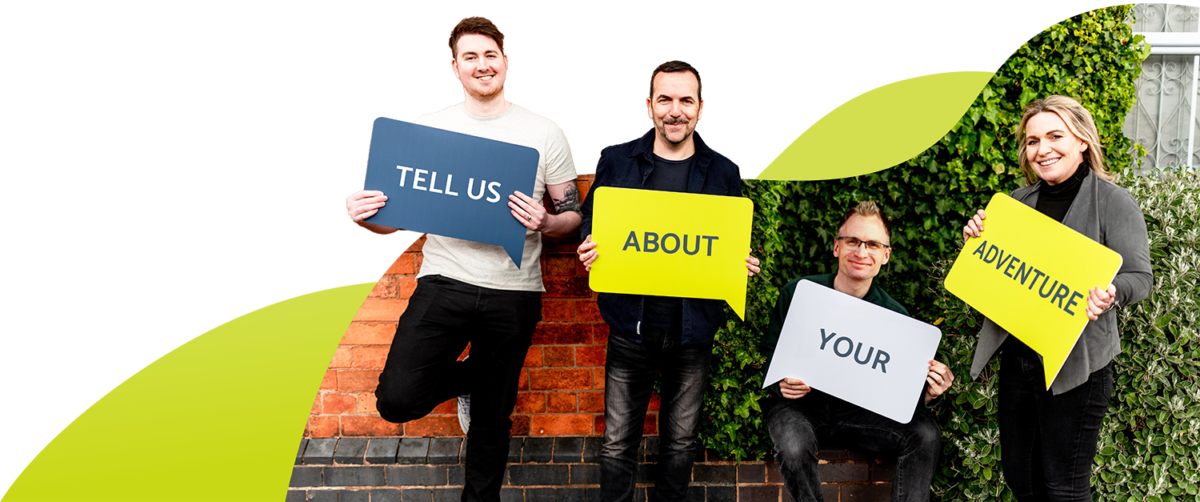 Adventure Team Holding Signs Tell Us About Your Adventure Image Website Design