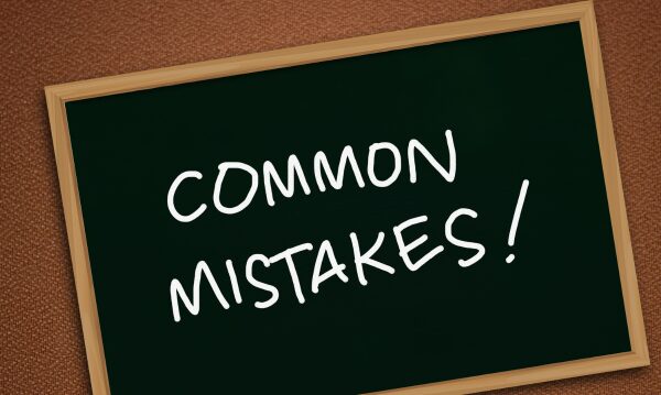 blackboard with common mistakes drawn on it to accompany most common black friday mistakes blog