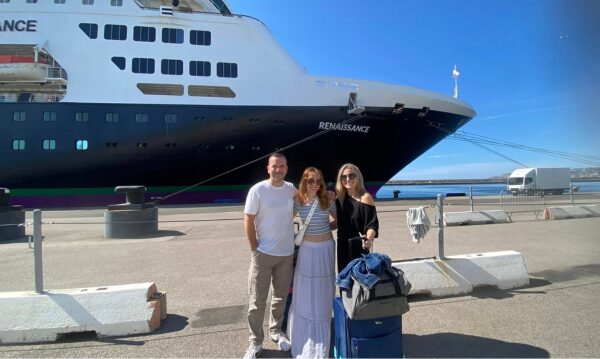 Penny and Warwick from Adventure Graphics standing wiht their daughter infront of her cruise ship to accompany a blog about work life balance for small business owners